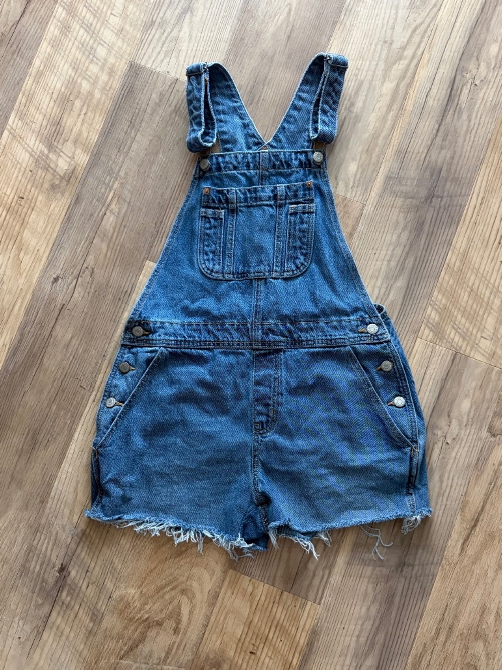 Old Navy Denim Overalls with Adjustable Straps and a frayed cut-off hem